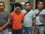 pelaku-mn-baju-orange-sedang-diamankan-anggota-buser.jpg