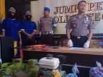 pelaku-pencurian-dengan-sasaran-minimarket-saat-ditunjukkan-kepada-wartawan_20180814_133154.jpg