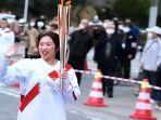 pelari-estafet-obor-olimpiade-di-fukushima.jpg