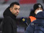 pelatih-barcelona-spanyol-xavi-memberikan-wawancara-sebelum-pertandingan.jpg