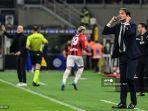 pelatih-kepala-inter-milan-italia-simone-inzaghi-kanan-bereaksi-selama-semifinal-piala-italia.jpg