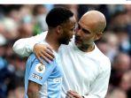 pelatih-manchester-city-pep-guardiola-dan-striker-raheem-sterling.jpg