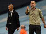 pelatih-real-madrid-prancis-zinedine-zidane-kiri-dan-manajer-spanyol-manchester-city-pep-guardiola.jpg