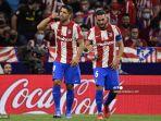 pemain-depan-atletico-madrid-uruguay-luis-suarez-kiri-merayakan-dengan-koke.jpg