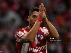pemain-depan-atletico-madrid-uruguay-luis-suarez-merayakan-setelah-mencetak-gol-kedua.jpg
