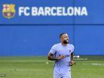 pemain-depan-barcelona-asal-belanda-memphis-depay-merayakan-setelah-mencetak-gol-ketiga.jpg