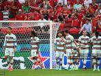 pemain-depan-portugal-cristiano-ronaldo-kiri-dan-rekan-satu-timnya-merayakan-gol-pertama-mereka.jpg