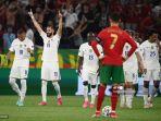 pemain-depan-prancis-karim-benzema-merayakan-mencetak-gol-kedua.jpg