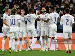 pemain-depan-real-madrid-asal-prancis-karim-benzema-tengah-merayakan-dengan-rekan-satu-tim.jpg