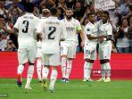 pemain-depan-real-madrid-vinicius-junior-kanan-merayakan-dengan-rekan-setimnya.jpg
