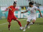 pemain-depan-wales-gareth-bale-kiri-ditandai-oleh-bek-swiss-ricardo-rodriguez.jpg