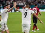 pemain-real-madrid-gareth-bale-dan-karim-benzema_20180919_142103.jpg