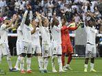 pemain-real-madrid-merayakan.jpg