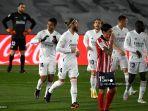 pemain-real-madrid-saat-merayakan-gol-casemiro-ke-gawang-atletico-madrid.jpg