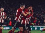 pemain-sheffield-united-merayakan-gol-ke-gawang-arsenal.jpg