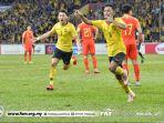 pemain-timnas-u-23-malaysia-merayakan-gol-ke-gawang-china.jpg