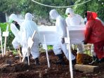 pemakaman-korban-virus-corona-covid-19-di-tpu-tegal-alur_20200407_190155.jpg