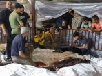 pemandangan-memilukan-setelah-rudal-hantam-rumah-sakit-di-gaza_20231018_095316.jpg