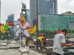 pemasangan-maskot-pon-xx-2021-di-bunderan-hi-jakarta_20210724_190549.jpg