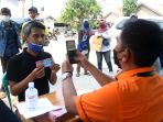 pembagian-bantuan-sosial-tunai_20210725_190322.jpg