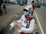 pembagian-masker-di-simpang-lima_20151026_151015.jpg