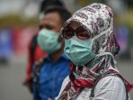 pembagian-masker-di-simpang-lima_20151026_151104.jpg