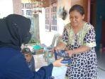pembagian-sarung-lebaran-kepada-warga-kura.jpg