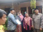 pembagian-sertifikat-pendaftaran-tanah-sistematis-lengkap-ptsldi-lhokseumaw.jpg
