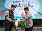 pembagiandagingkurban12wqea.jpg