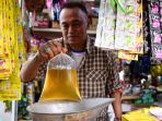 pembelian-minyak-goreng-curah-menggunakan-aplikasi_20220630_173416.jpg
