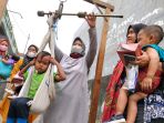 pemeriksaan-kesehatan-balita-di-posyandu-teratai-bandung_20211113_115455.jpg
