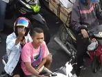 pemotor-tidak-pakai-helm-di-lampu-merah-di-bandung-dan-ditegur-cctv-bersuara.jpg