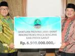 pemprov-jabar-berikan-bantuan-rp-65-miliar-untuk-penanganan-banjir-garut_20161014_155430.jpg