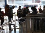 pemudik-jalani-tes-covid-19-di-terminal-terpadu-pulo-gebang_20210518_230811.jpg