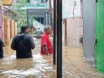 pemukiman-warga-yang-terendam-banjir.jpg