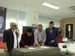penandatangan-mou-kerjasama-antara-simac-dan-dkppu.jpg