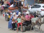 penduduk-rafah-palestina-meninggalkan-kota-itu-setelah-dibombardir-pasukan-idf.jpg