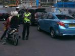 penerapan-denda-senilai-rp-500000-bagi-pemotor-tilang_20150223_135010.jpg