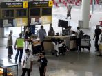 penerbangan-perdana-singapore-airlines-ke-bali_20220216_191139.jpg