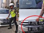 pengendara-mobil-terciduk-polisi-palsukan-pelat-nomor-agar-dapat-masuk-kawasan-ganjil-genap_20180729_205406.jpg