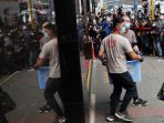 penggerebekan-media-hong-kong-stand-news-oleh-polisi_20211230_115651.jpg