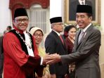 pengucapan-sumpah-jabatan-hakim-konstitusi-ridwan-mansyur_20231208_160010.jpg