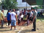 pengurus-pondok-pesantren-al-hikam-ii-mulai-menggali-pusara-kh-hasyim-muzadi_20170316_103527.jpg