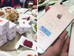 pengusaha-china-beri-iphone-untuk-teman-sekelas_20151222_153536_20151224_082212.jpg