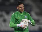 penjaga-gawang-brasil-ederson-saat-melakukan-pemanasan-sebelum-pertandingan-copa-america-2021.jpg
