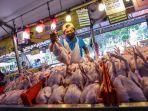 penjual-daging-unggas-di-sebuah-pasar.jpg