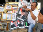 penjualan-bingkai-foto-jokowi-maruf-amin-laris-manis_20191025_123317.jpg