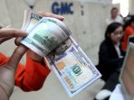 penukaran-mata-uang-dollar-di-bandung_20150512_202137.jpg