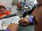 penukaran-mata-uang-dollar-di-bandung_20150512_202148.jpg