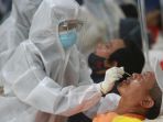 penumpang-ka-st-gambir-rapid-test-antigen-covid-19_20201223_194012.jpg